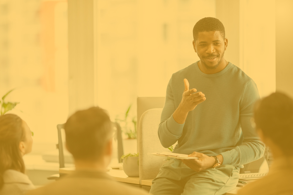 Group of people working out business plan in an office